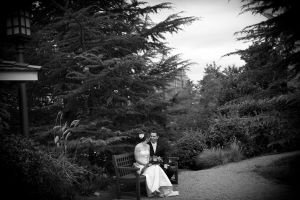 couple at villa christina with king and queen building